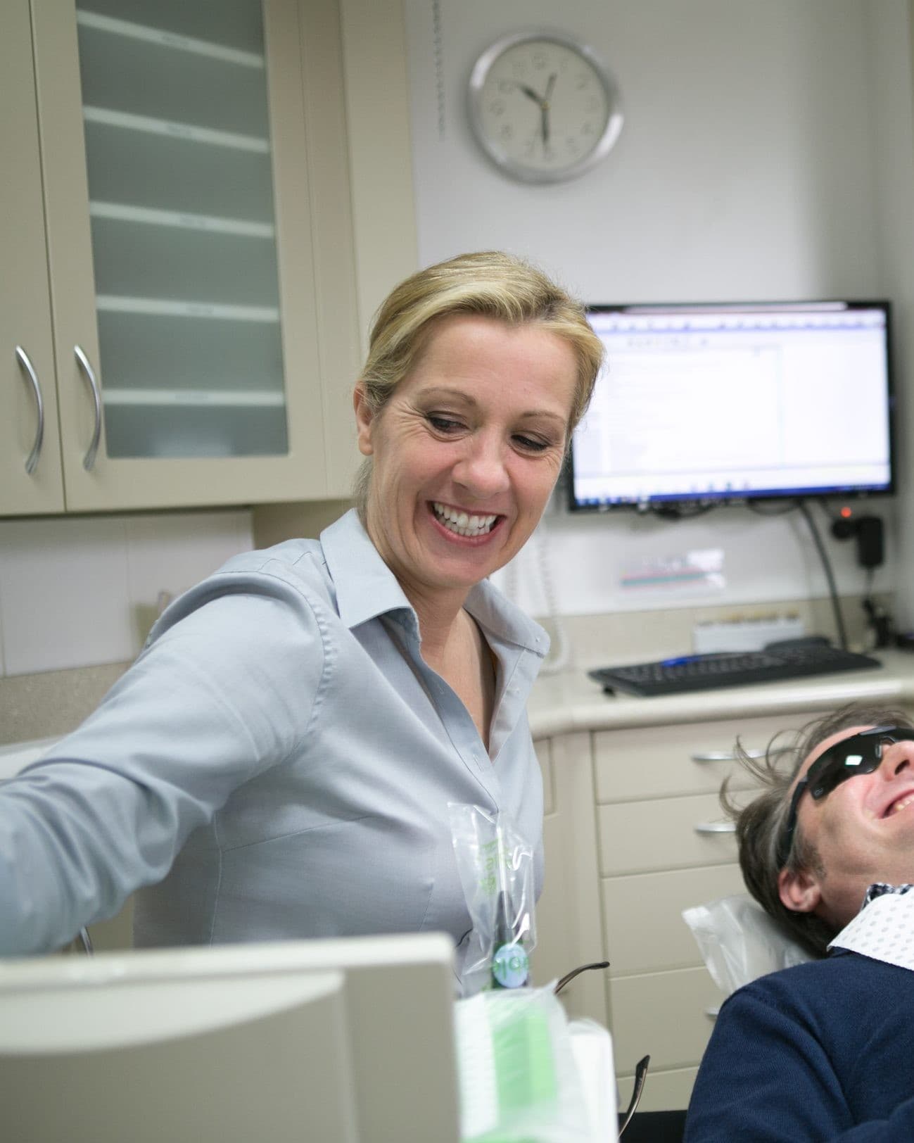 Dr Caitlin Oakley and a dental assistant with a patient at Fresh Dentistry in Blackburn