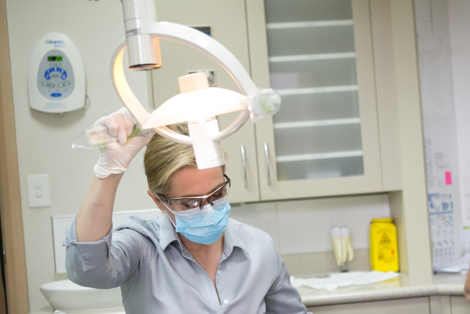 Dr Caitlin Oakley preparing to treat a patient at Fresh Dentistry in Blackburn