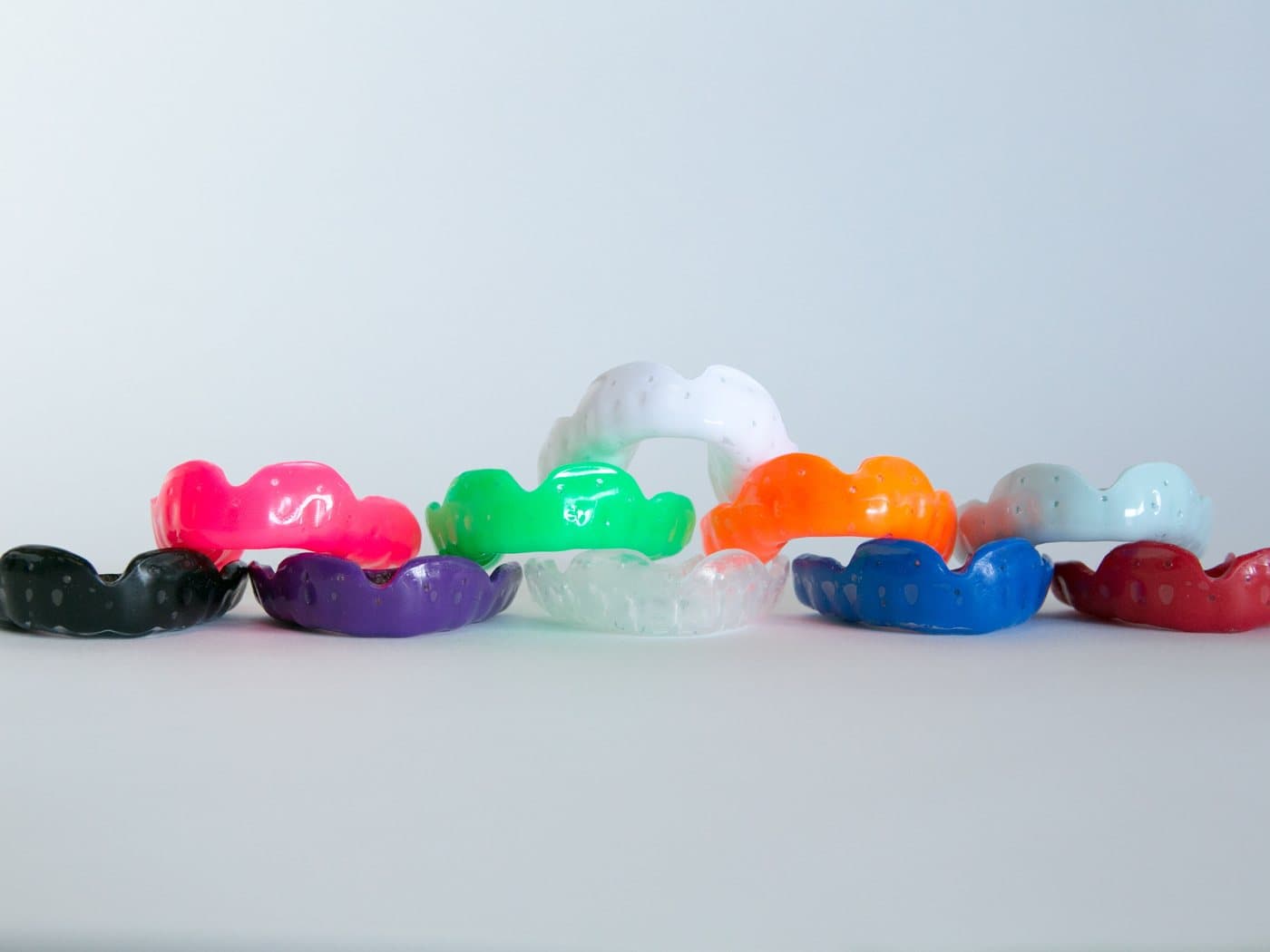 Custom-fitted mouthguards in a range of colours